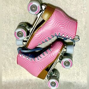 Impala Pink Checkered Derby Roller Skates, used